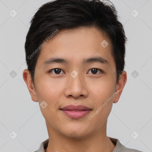 Joyful asian young-adult male with short  brown hair and brown eyes