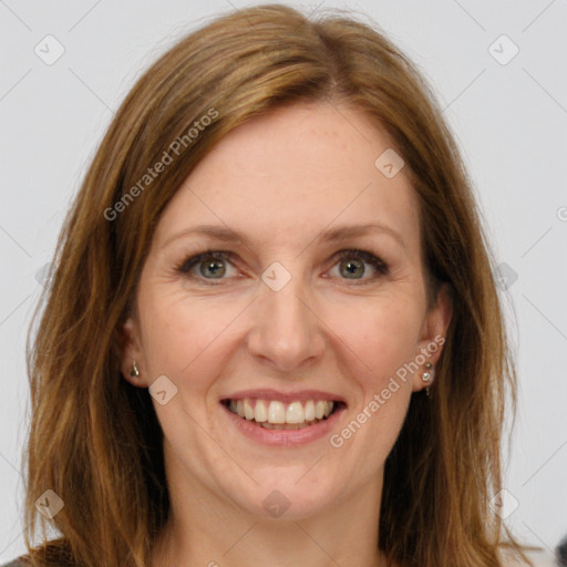 Joyful white young-adult female with long  brown hair and green eyes