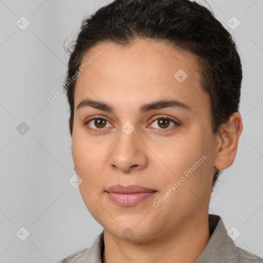 Joyful white young-adult female with short  brown hair and brown eyes