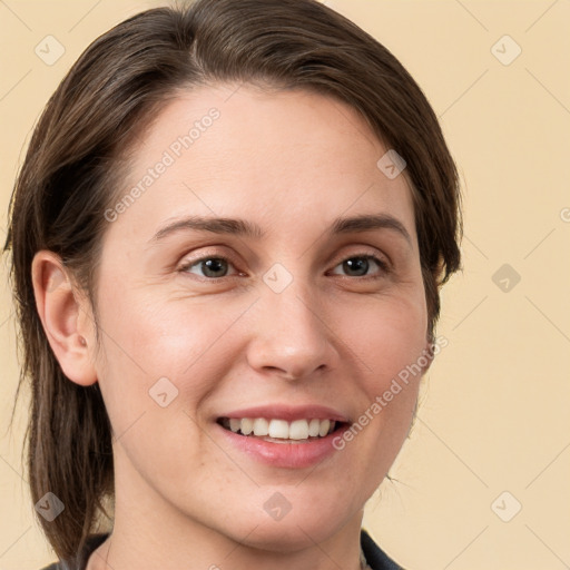 Joyful white young-adult female with medium  brown hair and grey eyes