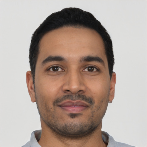 Neutral latino young-adult male with short  black hair and brown eyes