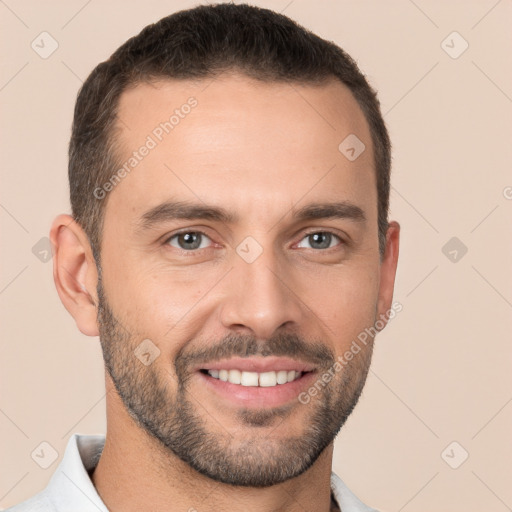 Joyful white young-adult male with short  brown hair and brown eyes