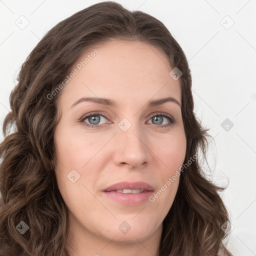 Joyful white young-adult female with long  brown hair and green eyes