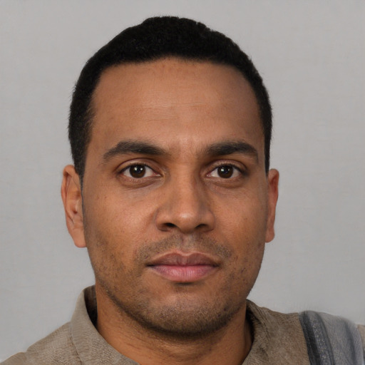 Neutral white young-adult male with short  black hair and brown eyes
