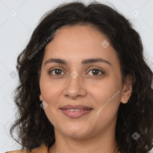 Joyful white adult female with long  brown hair and brown eyes