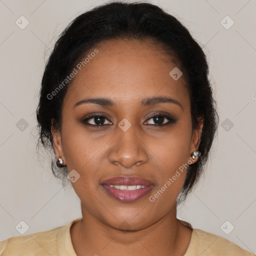 Joyful black young-adult female with medium  brown hair and brown eyes