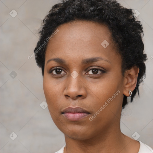 Neutral black young-adult female with short  black hair and brown eyes