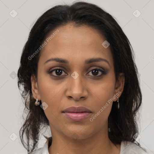 Joyful black young-adult female with medium  brown hair and brown eyes