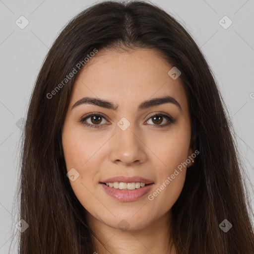 Joyful white young-adult female with long  brown hair and brown eyes