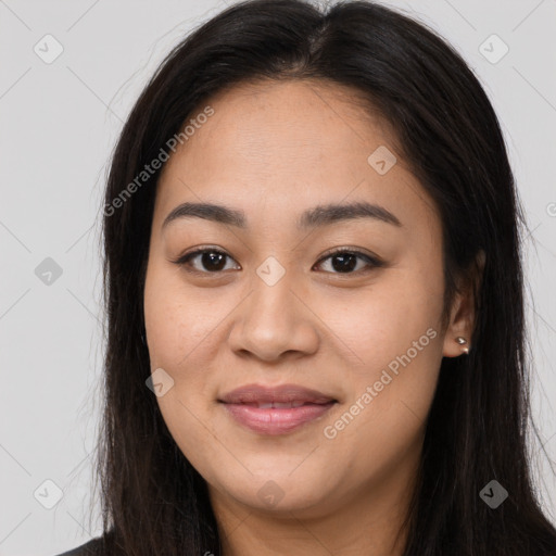 Joyful asian young-adult female with long  brown hair and brown eyes