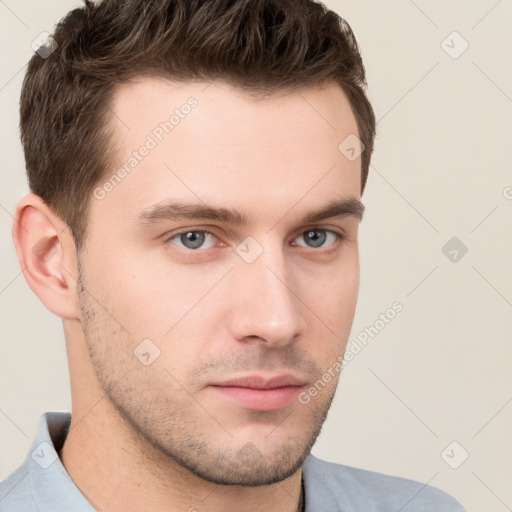 Neutral white young-adult male with short  brown hair and brown eyes