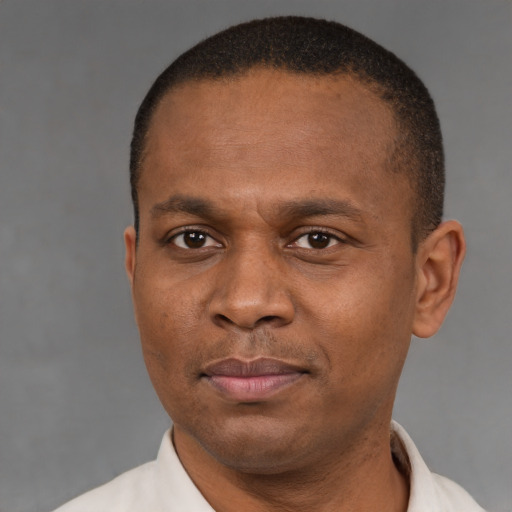 Neutral black adult male with short  brown hair and brown eyes