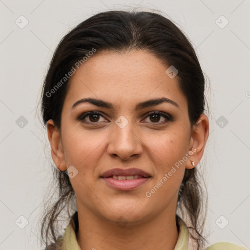 Joyful latino young-adult female with medium  brown hair and brown eyes