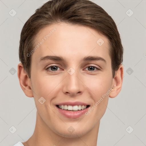 Joyful white young-adult female with short  brown hair and grey eyes