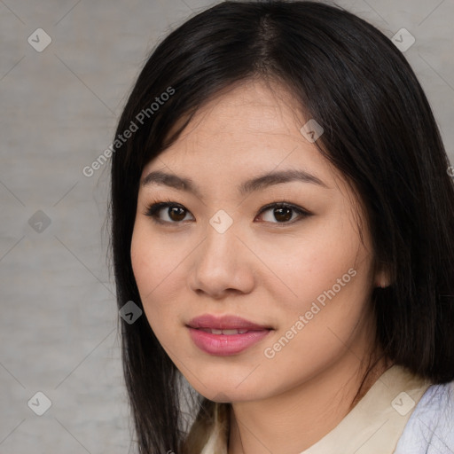 Joyful asian young-adult female with medium  black hair and brown eyes