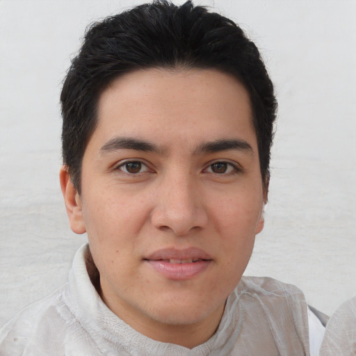 Joyful asian young-adult male with short  brown hair and brown eyes