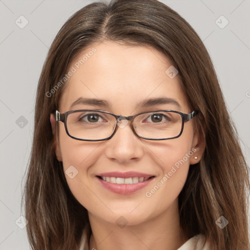 Joyful white young-adult female with long  brown hair and grey eyes