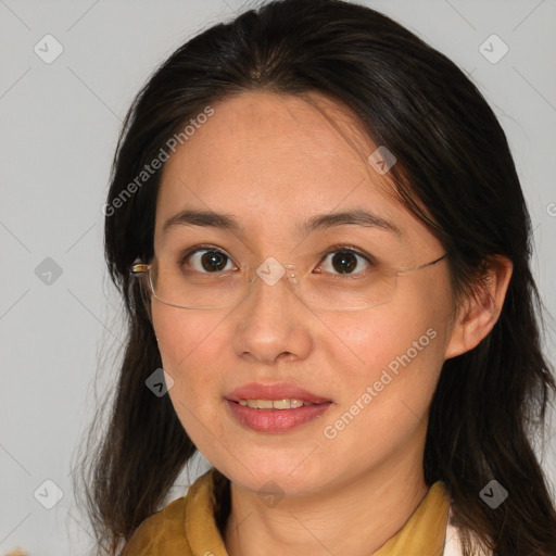 Joyful white adult female with long  brown hair and brown eyes