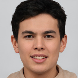 Joyful asian young-adult male with short  brown hair and brown eyes