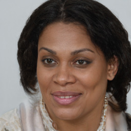 Joyful white adult female with medium  brown hair and brown eyes