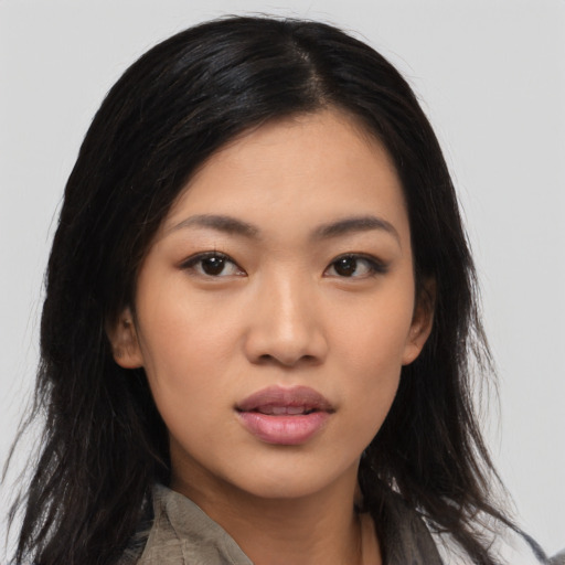Neutral asian young-adult female with medium  black hair and brown eyes