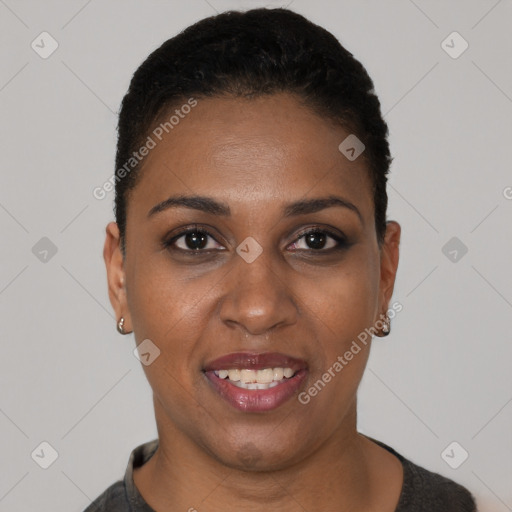 Joyful black young-adult female with short  black hair and brown eyes