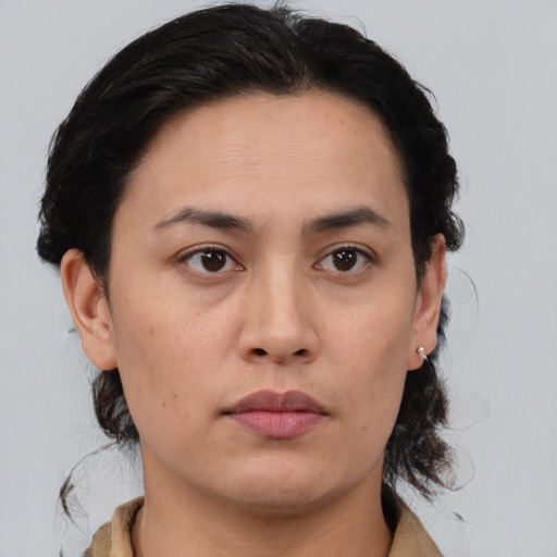 Neutral asian young-adult female with medium  brown hair and brown eyes