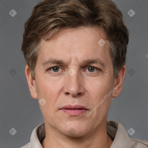 Joyful white adult male with short  brown hair and grey eyes