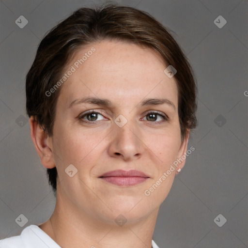 Joyful white adult female with short  brown hair and grey eyes