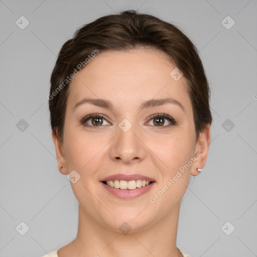 Joyful white young-adult female with short  brown hair and brown eyes