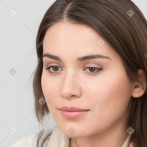 Neutral white young-adult female with long  brown hair and brown eyes