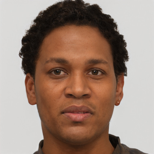 Neutral black young-adult male with short  brown hair and brown eyes