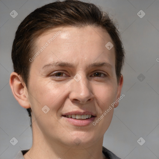 Joyful white adult female with short  brown hair and grey eyes