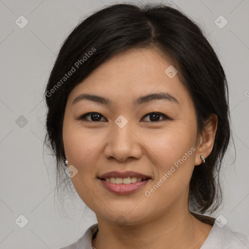 Joyful asian young-adult female with medium  brown hair and brown eyes