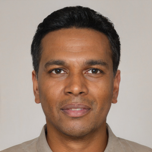 Neutral black young-adult male with short  black hair and brown eyes