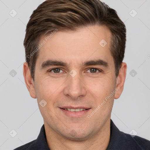 Joyful white adult male with short  brown hair and brown eyes