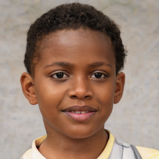 Joyful black child female with short  brown hair and brown eyes