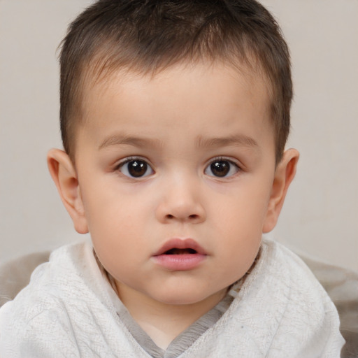 Neutral white child male with short  brown hair and brown eyes