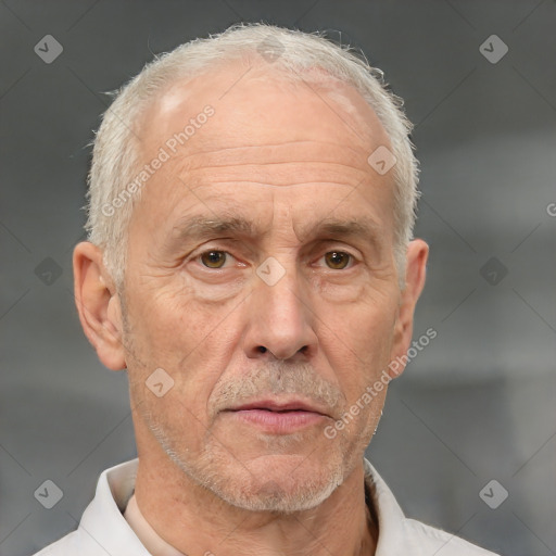 Neutral white middle-aged male with short  gray hair and brown eyes