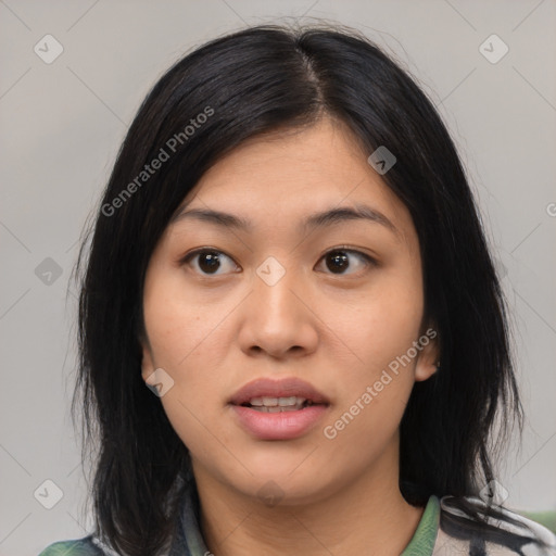 Joyful asian young-adult female with medium  black hair and brown eyes