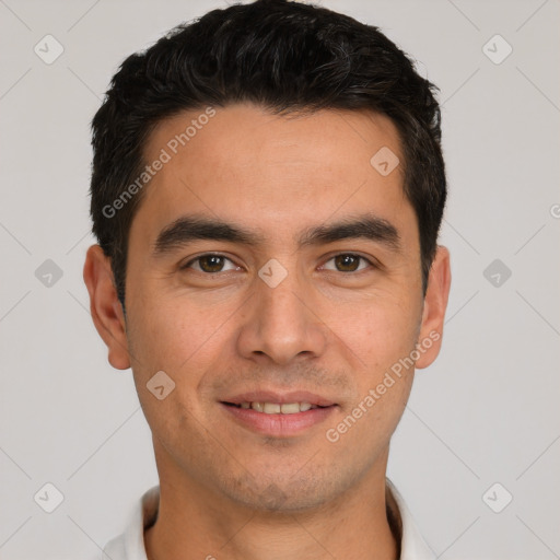 Joyful white young-adult male with short  black hair and brown eyes