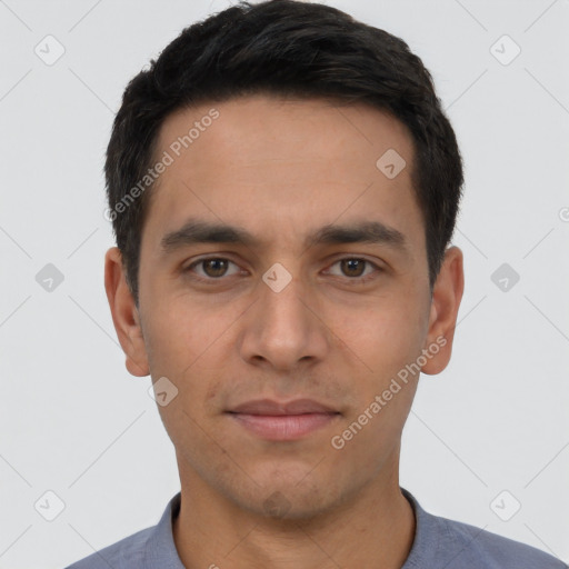 Joyful white young-adult male with short  black hair and brown eyes