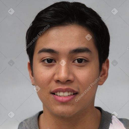 Joyful asian young-adult male with short  black hair and brown eyes