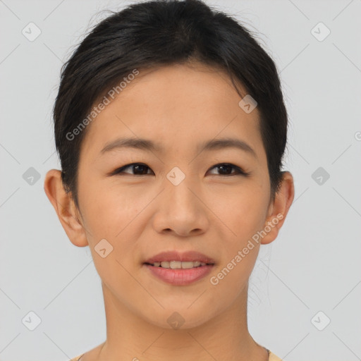 Joyful asian young-adult female with short  brown hair and brown eyes