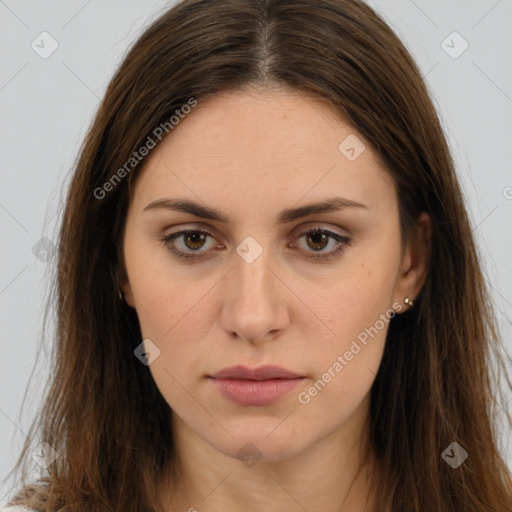 Neutral white young-adult female with long  brown hair and brown eyes