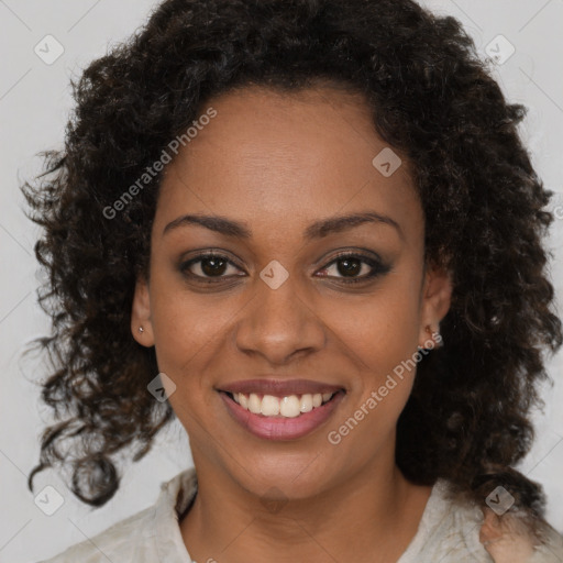 Joyful black young-adult female with medium  brown hair and brown eyes