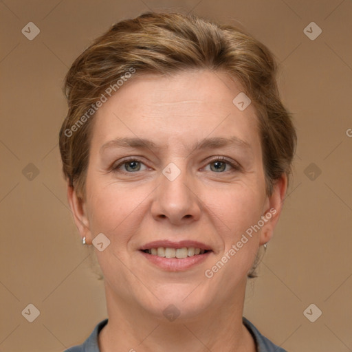 Joyful white adult female with short  brown hair and grey eyes