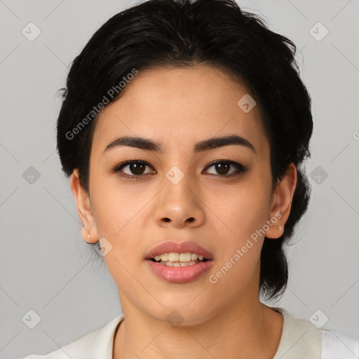 Joyful asian young-adult female with medium  black hair and brown eyes