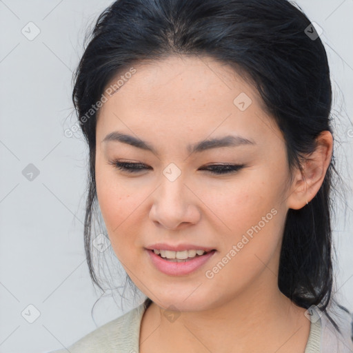 Joyful asian young-adult female with medium  brown hair and brown eyes