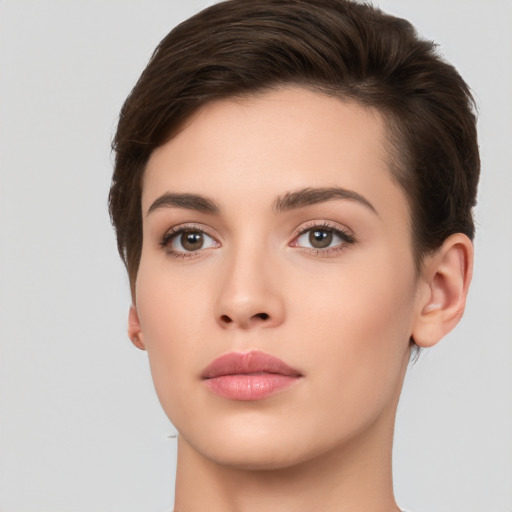 Neutral white young-adult female with short  brown hair and brown eyes